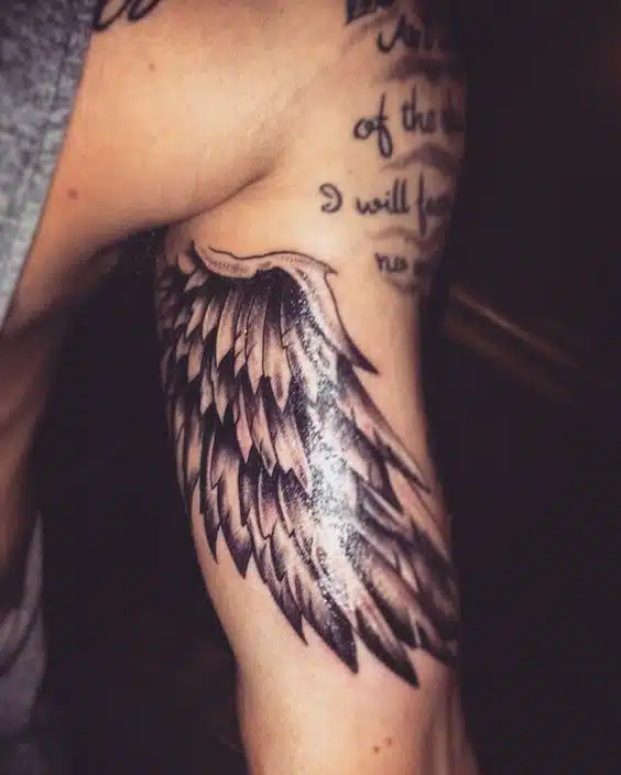 Angel Wing Bicep Tattoo