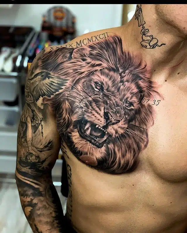 tribal lion chest tattoos