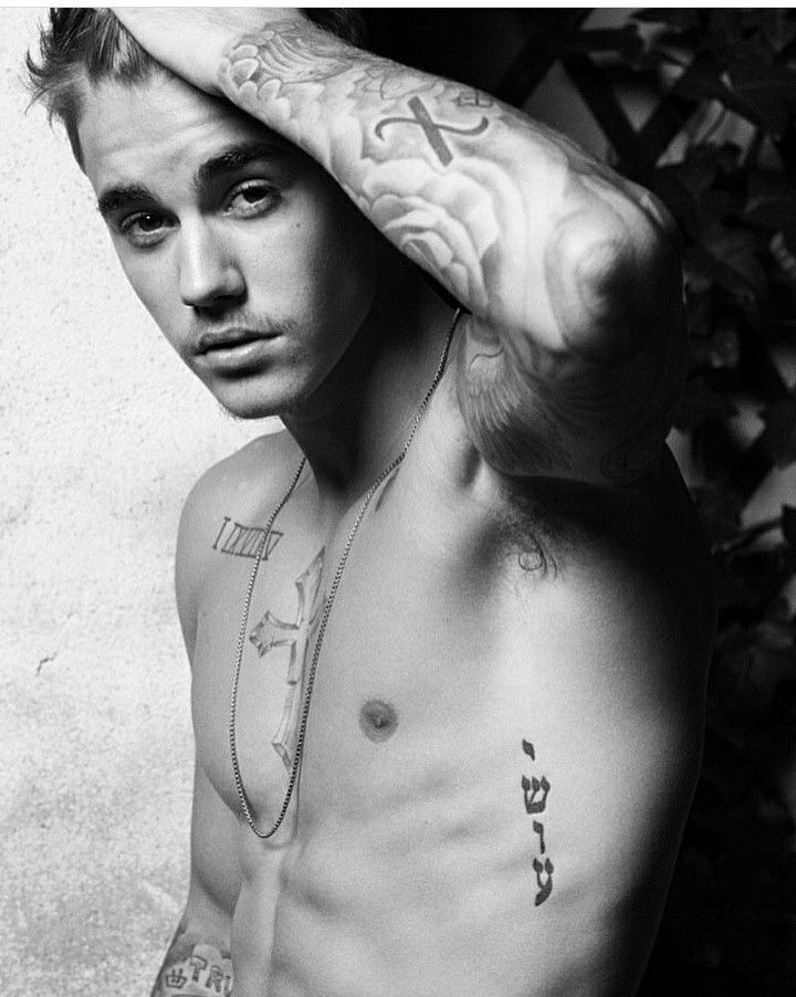 24 of Justin Biebers tattoos explained in slightly creepy detail